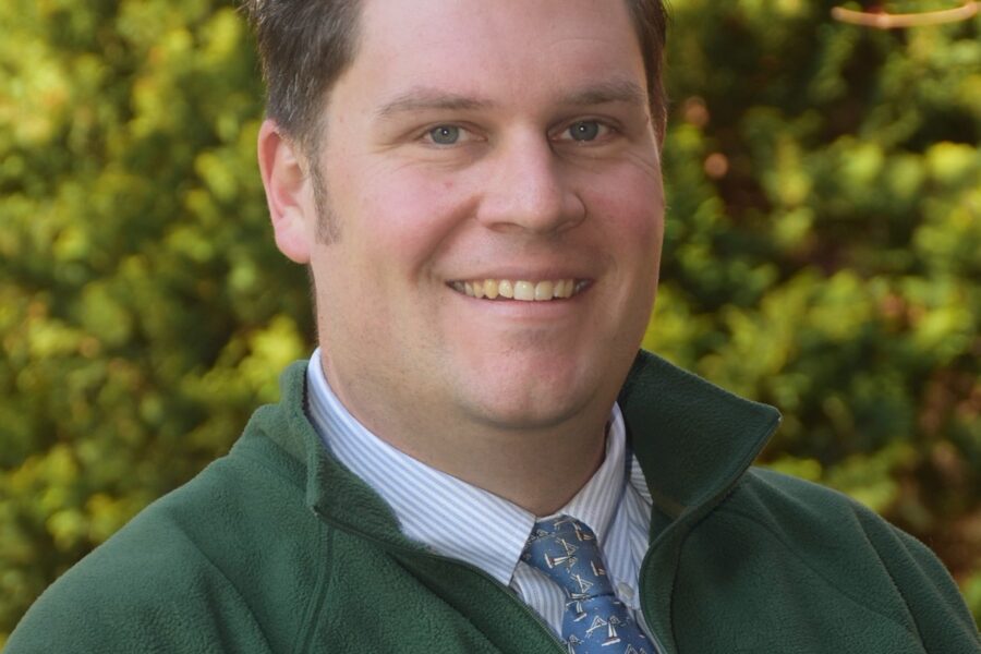 Math Teacher, Alex Fernandez, in his school portrait